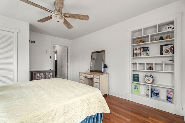 bedroom featuring dark wood-type flooring and ceiling fan