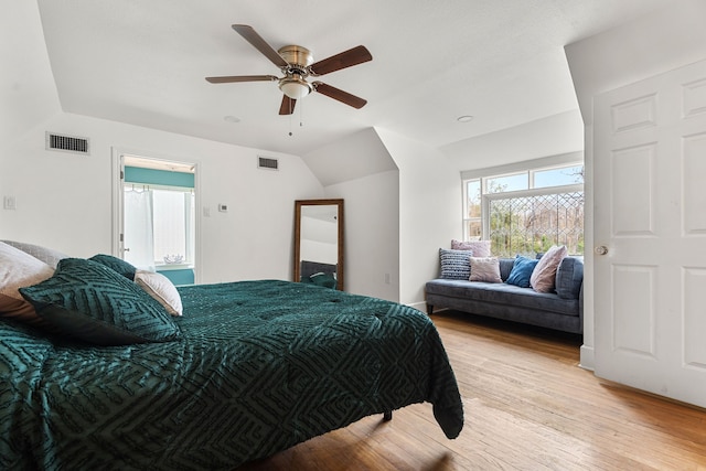 bedroom with ceiling fan and light hardwood / wood-style floors