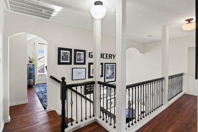 hallway featuring dark wood-type flooring