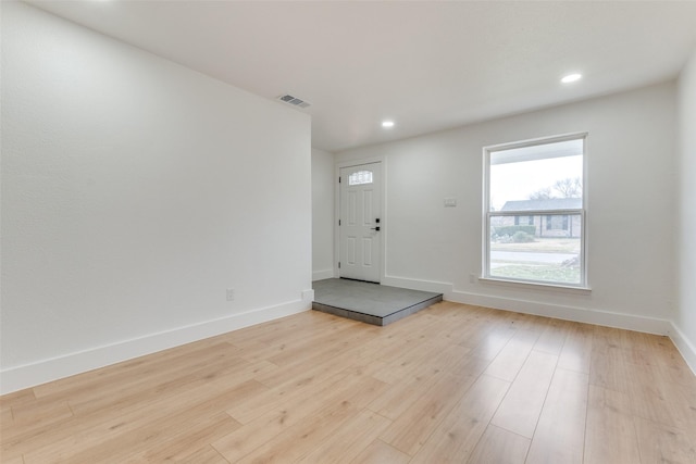 entrance foyer featuring light hardwood / wood-style floors