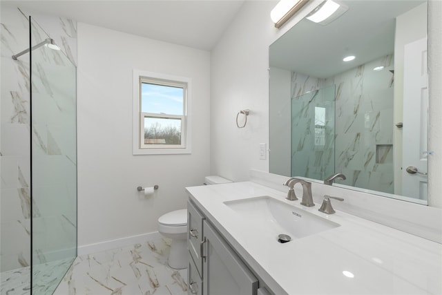 bathroom with a marble finish shower, baseboards, toilet, marble finish floor, and vanity