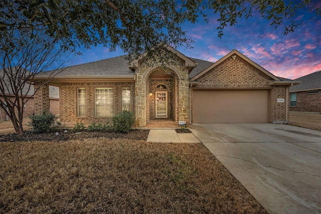 ranch-style home with a garage