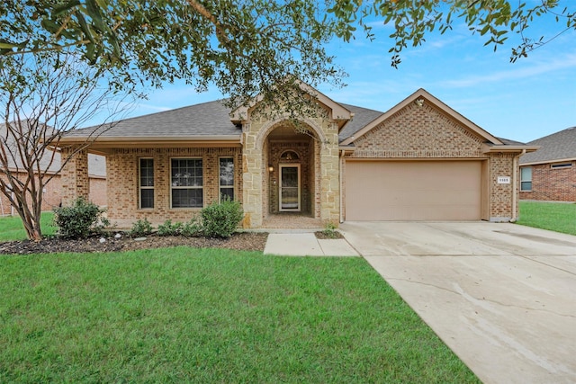 single story home with a garage and a front yard