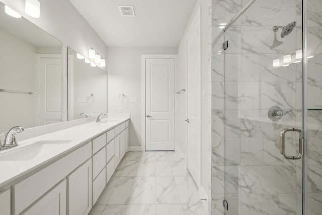 bathroom with vanity and walk in shower