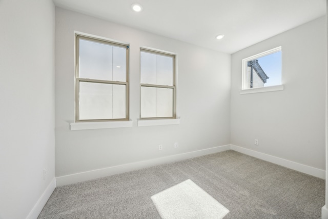 view of carpeted spare room