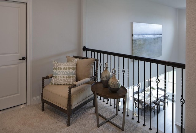 sitting room featuring carpet floors