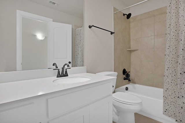 full bathroom with vanity, toilet, and shower / bath combo with shower curtain