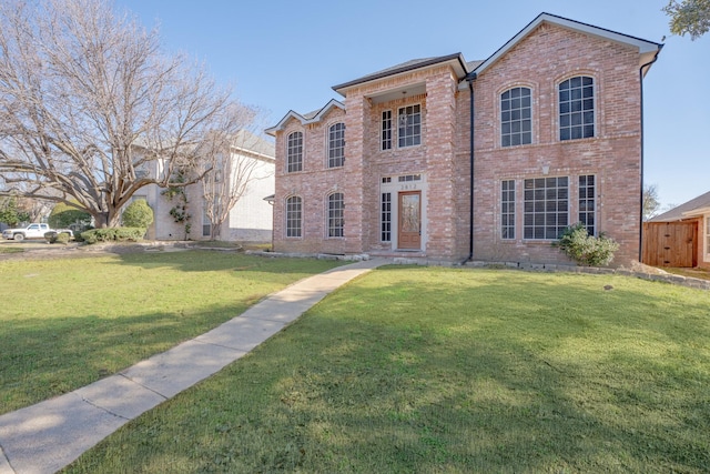 view of front of house featuring a front lawn