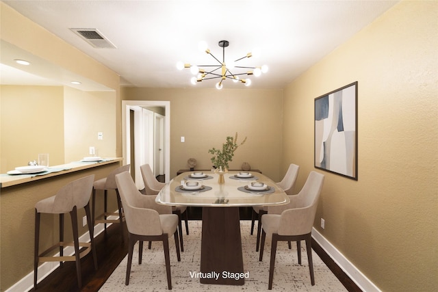 dining room featuring an inviting chandelier