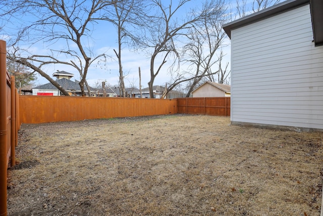 view of yard featuring a fenced backyard