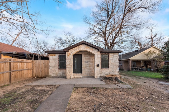 view of front of home with a patio