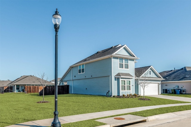 view of property exterior featuring a garage and a lawn