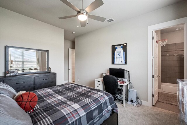 bedroom with light colored carpet and a chandelier