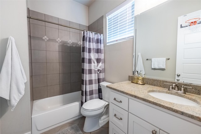 full bathroom featuring tile patterned floors, vanity, toilet, and shower / bath combo