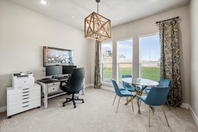 carpeted office space with an inviting chandelier, visible vents, and baseboards