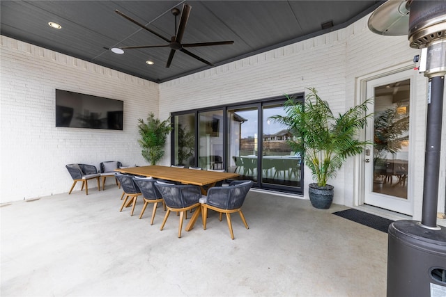 view of patio / terrace featuring ceiling fan