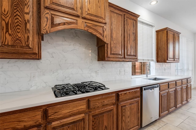 9328 Old Veranda Rd, Plano, TX 75024 - kitchen featuring dishwasher, black gas cooktop, a sink, backsplash, and light countertops