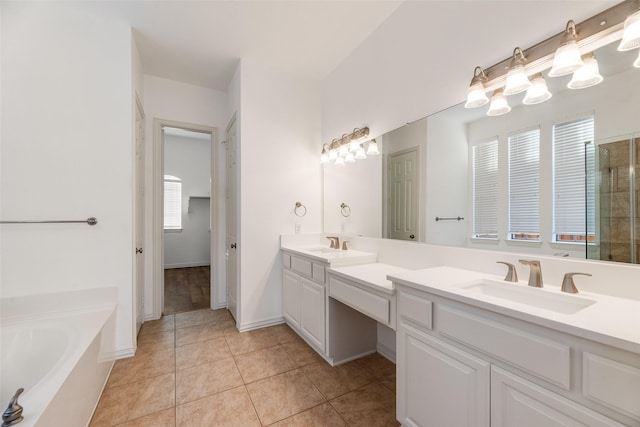 9328 Old Veranda Rd, Plano, TX 75024 - full bath featuring double vanity, a bath, tile patterned floors, and an enclosed shower