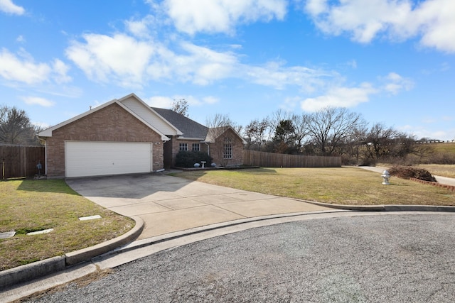 view of front facade with a garage and a front yard