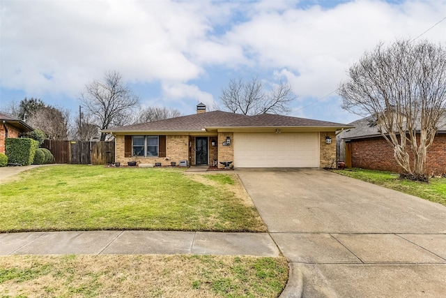 ranch-style home featuring a garage and a front yard