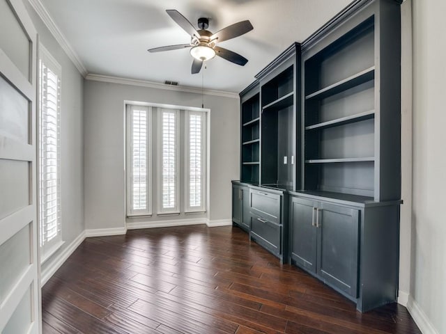 interior space with crown molding, dark wood-type flooring, and ceiling fan