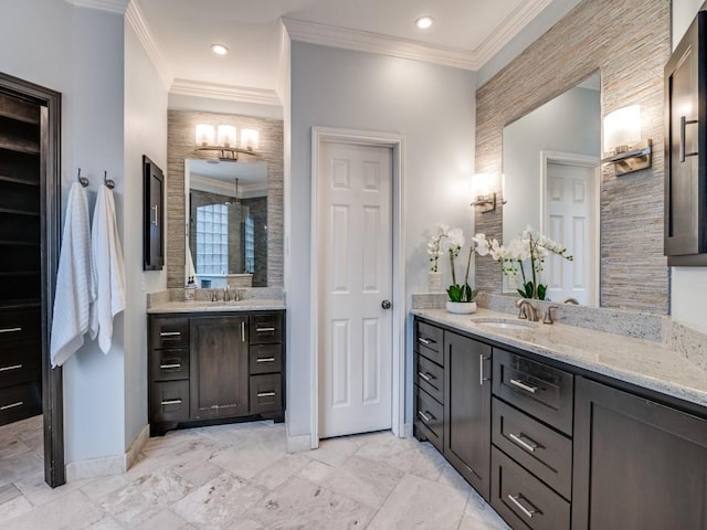 bathroom with vanity and crown molding