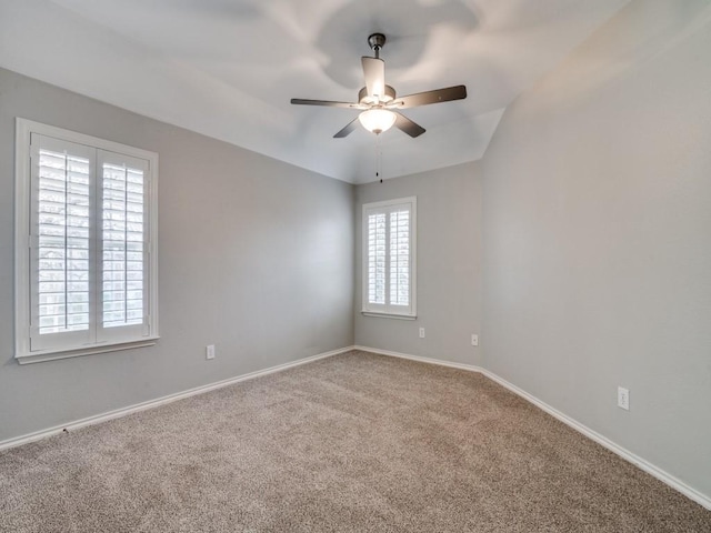 carpeted empty room with ceiling fan