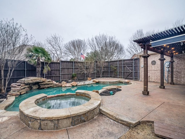 view of pool featuring an in ground hot tub and a patio area