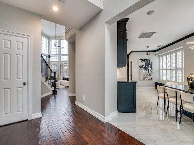 interior space featuring dark hardwood / wood-style flooring and a healthy amount of sunlight