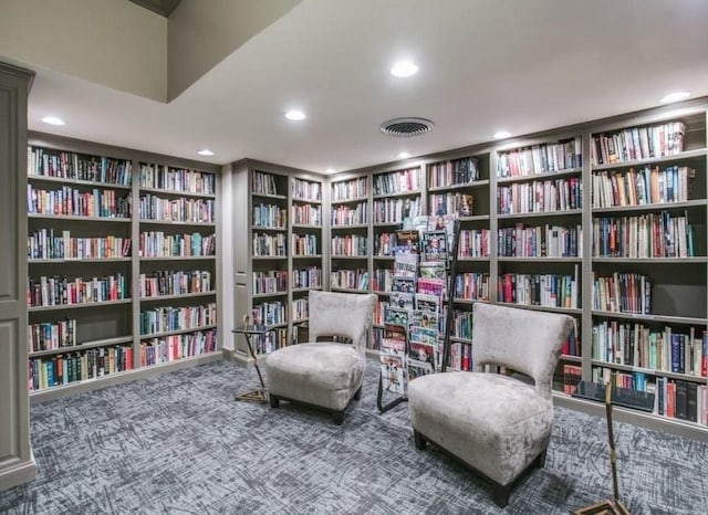 living area with carpet flooring