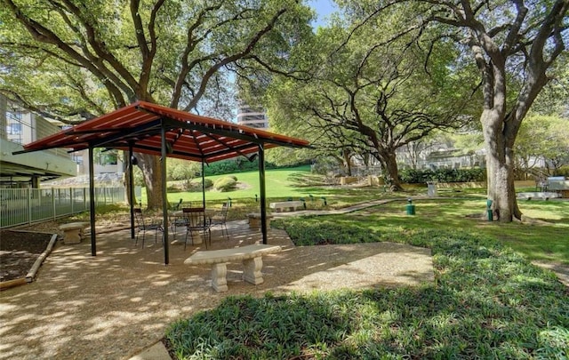 view of property's community featuring a yard and a gazebo