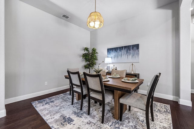 dining room featuring dark hardwood / wood-style floors