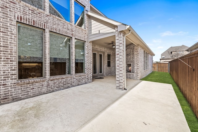 view of patio / terrace featuring ceiling fan