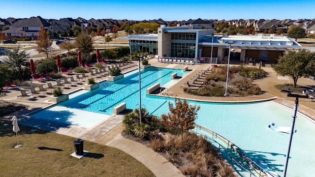 view of swimming pool featuring a patio area