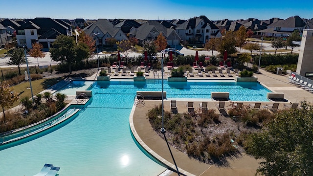 view of swimming pool with a patio area