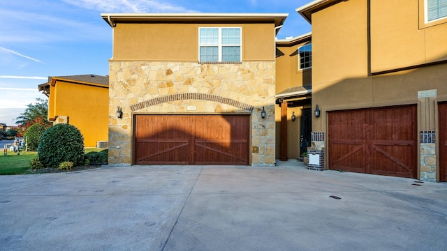 front of property with a garage