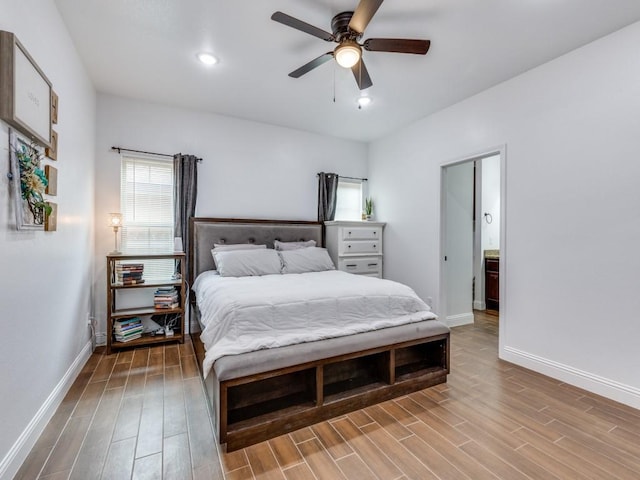 bedroom featuring light hardwood / wood-style flooring and ceiling fan