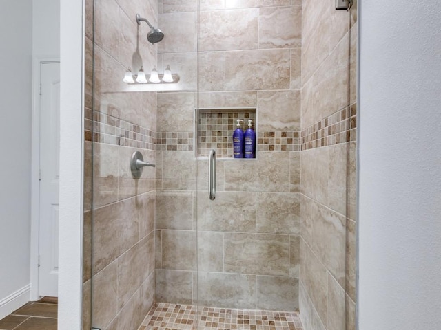 bathroom featuring an enclosed shower