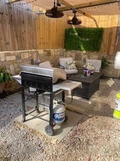 view of patio with ceiling fan