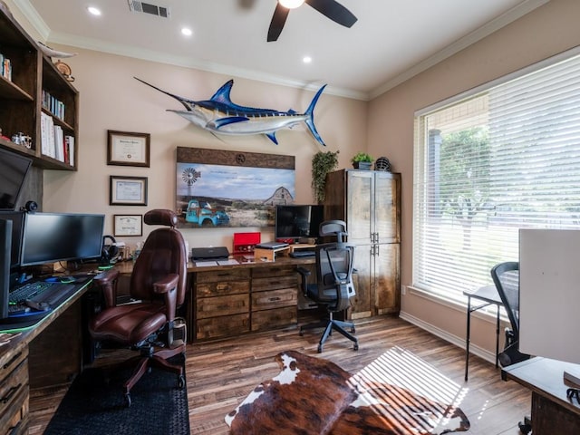 office with ceiling fan, ornamental molding, and light hardwood / wood-style floors