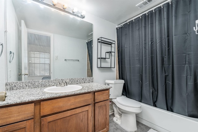 full bathroom with vanity, toilet, and shower / tub combo