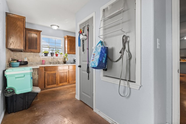 kitchen with sink and decorative backsplash