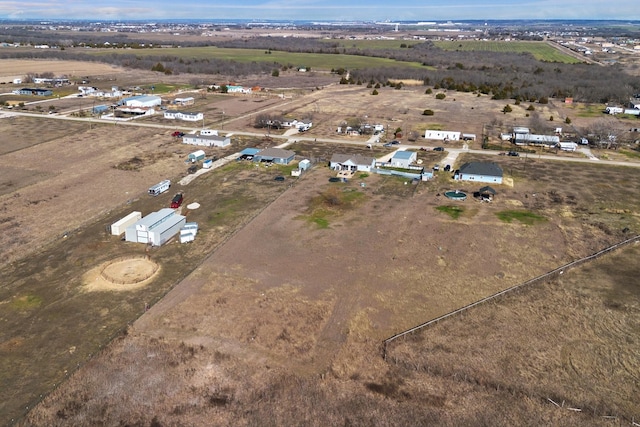 birds eye view of property featuring a rural view