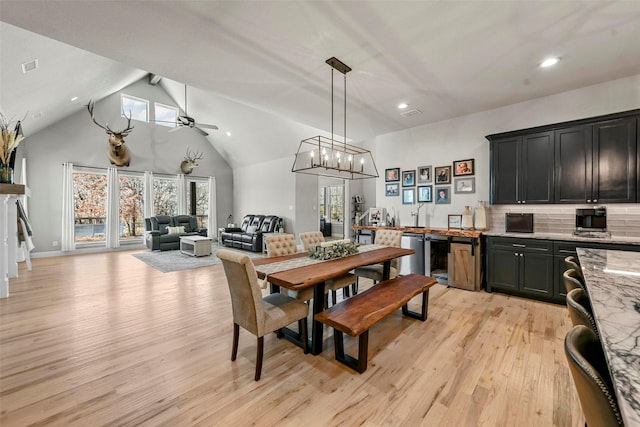 dining area featuring recessed lighting, visible vents, ceiling fan, high vaulted ceiling, and light wood-type flooring