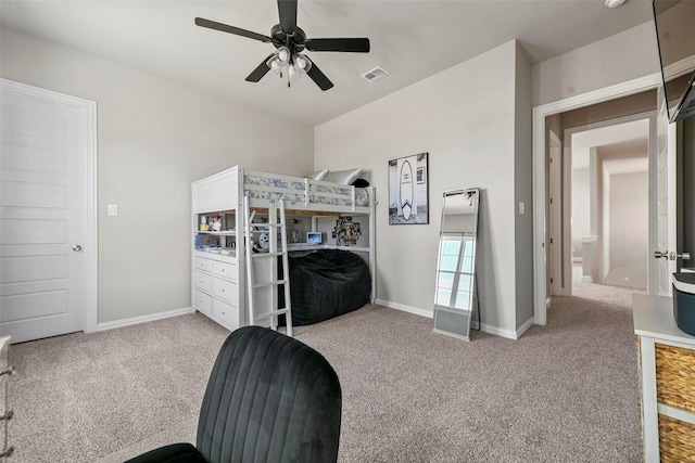 bedroom with light carpet, ceiling fan, visible vents, and baseboards