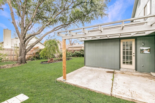 view of yard with a pergola and a patio area