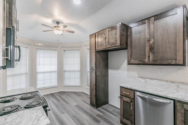 kitchen featuring light stone counters, dark brown cabinets, ceiling fan, stainless steel appliances, and light hardwood / wood-style floors