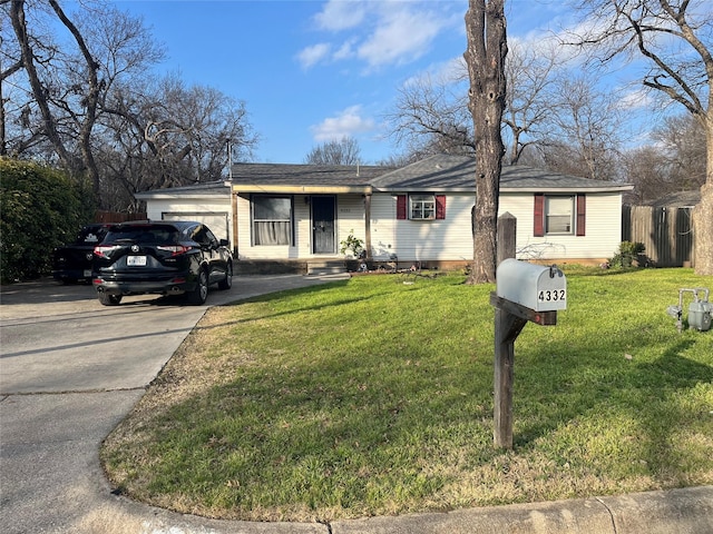 single story home with a garage and a front yard