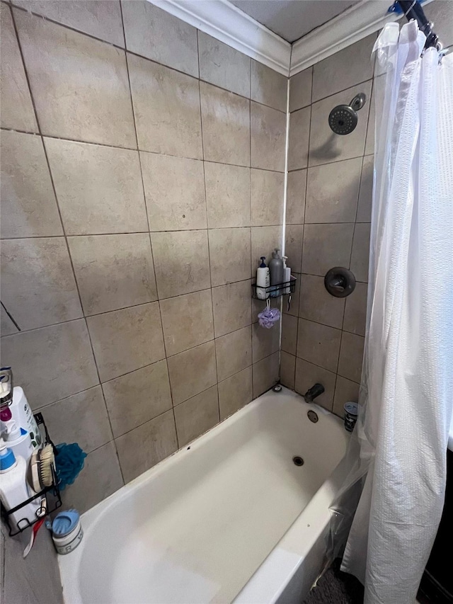 full bath featuring shower / tub combo with curtain