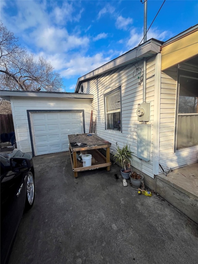 view of side of property featuring driveway